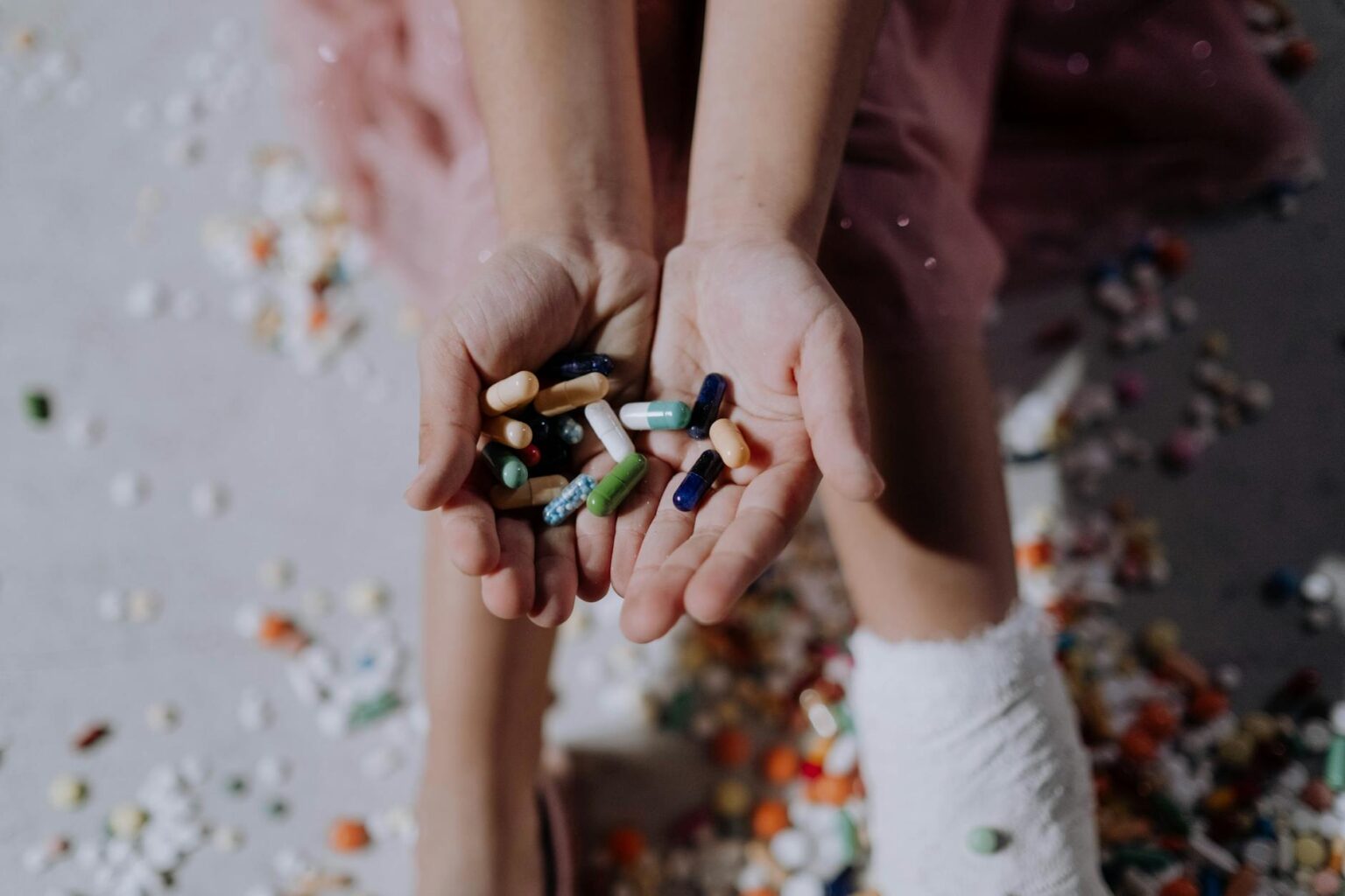 woman with assorted color nail polish